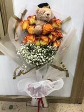 Roses and bear wrapped