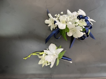 White orchid  corsage and boutonnière